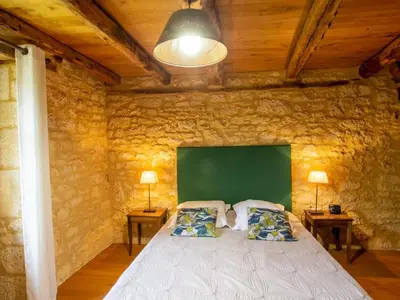 Un ou plusieurs lits dans un hébergement de l'établissement Maison du XIVe siècle avec WiFi et animaux admis près de Sarlat - FR-1-616-152