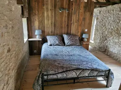 Un ou plusieurs lits dans un hébergement de l'établissement Ancienne soue aménagée proche Sarlat