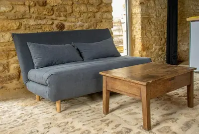 Coin salon dans l'établissement Ancienne soue aménagée proche Sarlat