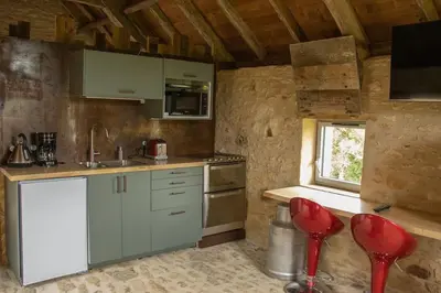 Cuisine ou kitchenette dans l'établissement Ancienne soue aménagée proche Sarlat
