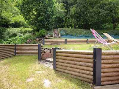 Jardin de l'établissement Chalet moderne 92m², Wi-Fi, proche Mont-Dore - FR-1-608-206