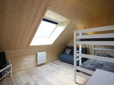 Un ou plusieurs lits dans un hébergement de l'établissement Chalet moderne 92m², Wi-Fi, proche Mont-Dore - FR-1-608-206