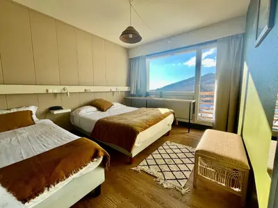 Un ou plusieurs lits dans un hébergement de l'établissement Hotel Perdrix