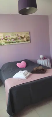 Un ou plusieurs lits dans un hébergement de l'établissement Montignac lascaux chambre