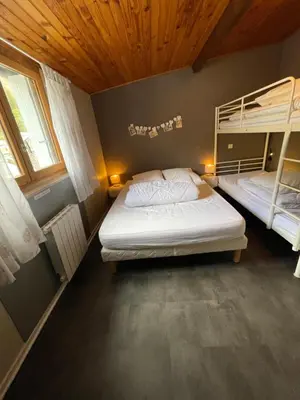 Un ou plusieurs lits dans un hébergement de l'établissement Appartement en hyper centre