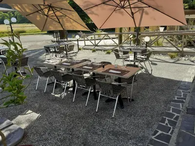 Restaurant ou autre lieu de restauration dans l'établissement L'Auberge