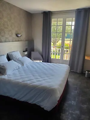 Un ou plusieurs lits dans un hébergement de l'établissement L'Auberge