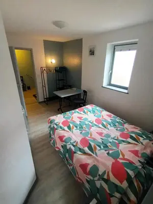 Un ou plusieurs lits dans un hébergement de l'établissement Le Miraillet, chambre hôte