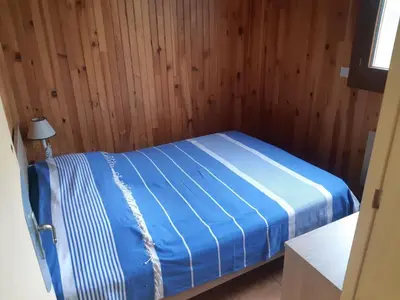 Un ou plusieurs lits dans un hébergement de l'établissement maison a la campagne avec piscine