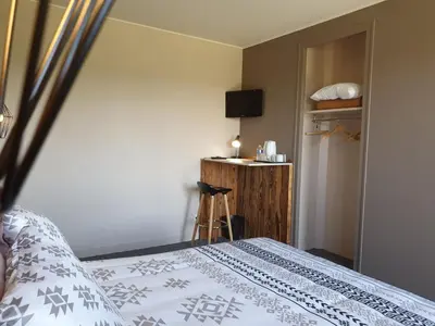 Un ou plusieurs lits dans un hébergement de l'établissement Auberge du Bois de l'étang - Motel les Tilleuls