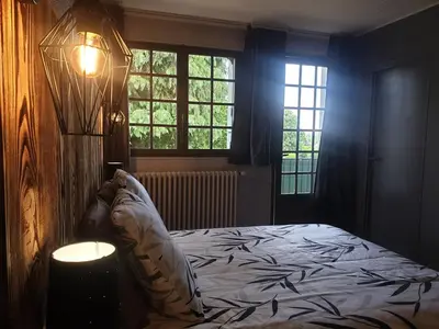 Un ou plusieurs lits dans un hébergement de l'établissement Auberge du Bois de l'étang - Motel les Tilleuls