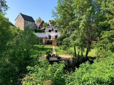 Jardin de l'établissement Villa au bord de la Rivièr