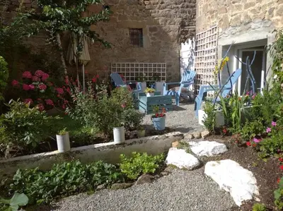 Jardin de l'établissement Appartement rouge avec jardin