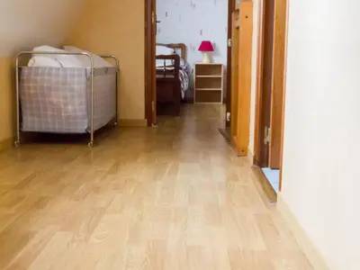 Un ou plusieurs lits dans un hébergement de l'établissement Charmante maison individuelle avec terrasse et BBQ en Dordogne, animaux acceptés - FR-1-616-185