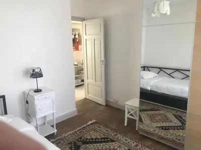 Un ou plusieurs lits dans un hébergement de l'établissement Appartement Marion en coeur de ville 2 à 4 personnes