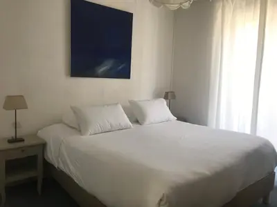 Un ou plusieurs lits dans un hébergement de l'établissement Appartement Marion en coeur de ville 2 à 4 personnes