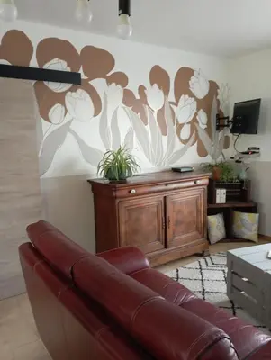 Télévision ou salle de divertissement dans l'établissement le gite de margot