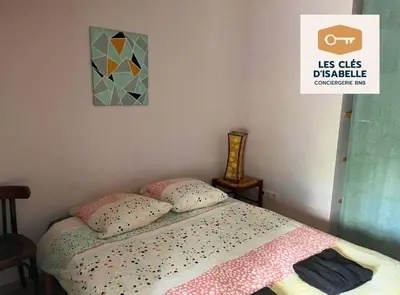 Un ou plusieurs lits dans un hébergement de l'établissement Maison entière feytiat