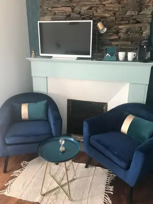 Télévision ou salle de divertissement dans l'établissement Chambres d'hôtes L'âme de Travassac