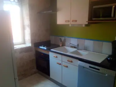 Cuisine ou kitchenette dans l'établissement Gîte chaleureux avec jacuzzi