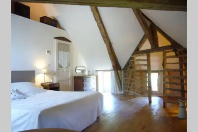 Un ou plusieurs lits dans un hébergement de l'établissement Gîte écologique en vallée de la Dordogne Lotoise