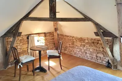 Un ou plusieurs lits dans un hébergement de l'établissement Gîte écologique en vallée de la Dordogne Lotoise