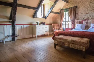 Un ou plusieurs lits dans un hébergement de l'établissement La ferme du coustal
