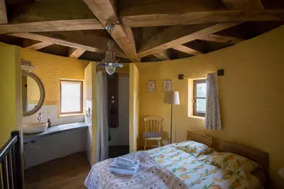Un ou plusieurs lits dans un hébergement de l'établissement La ferme du coustal
