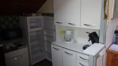 Cuisine ou kitchenette dans l'établissement NANA 63