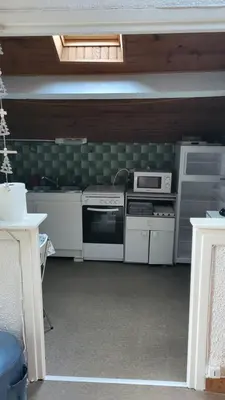 Cuisine ou kitchenette dans l'établissement NANA 63