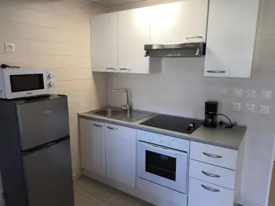 Cuisine ou kitchenette dans l'établissement Studio Bellevue