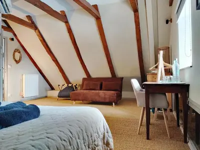 Un ou plusieurs lits dans un hébergement de l'établissement Maison d'Hôtes La Grange