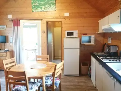 Cuisine ou kitchenette dans l'établissement Le Chalet de Lilie