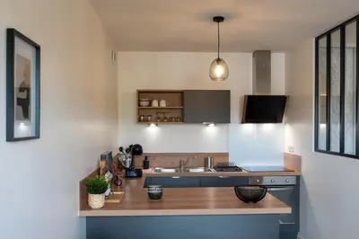 Cuisine ou kitchenette dans l'établissement L'Instant Terrasse - 1 Chambre