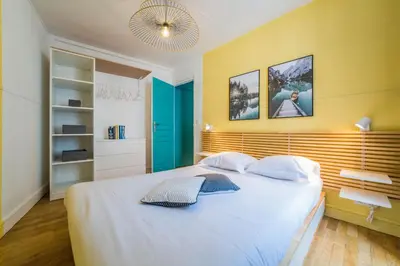 Un ou plusieurs lits dans un hébergement de l'établissement Le Contemporain - 1 Chambre