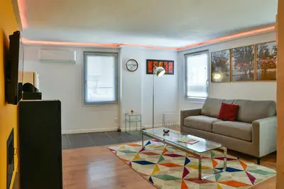 Coin salon dans l'établissement Échoppe Briviste - 1 Chambre
