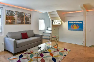 Coin salon dans l'établissement Échoppe Briviste - 1 Chambre