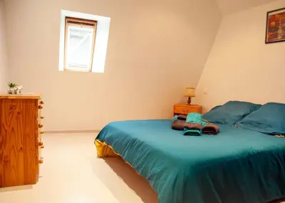 Un ou plusieurs lits dans un hébergement de l'établissement Maison de village à Puybrun