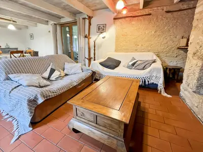Coin salon dans l'établissement Maison chaleureuse au coeur de la nature Montignac Lascaux Dordogne 4 pers