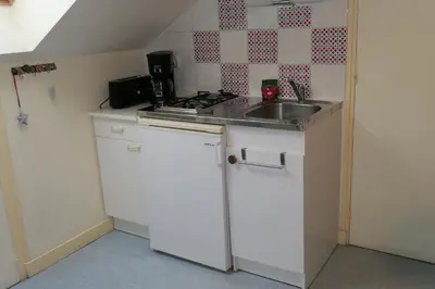 Cuisine ou kitchenette dans l'établissement Location Le Pim's à 
