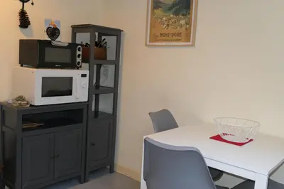 Cuisine ou kitchenette dans l'établissement Location Le Pim's à 