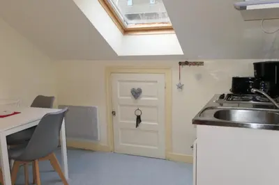 Cuisine ou kitchenette dans l'établissement Location Le Pim's à 