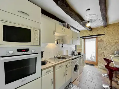 Cuisine ou kitchenette dans l'établissement Le Clos de la Musardise - Gîtes de Charme avec Piscine Chauffée