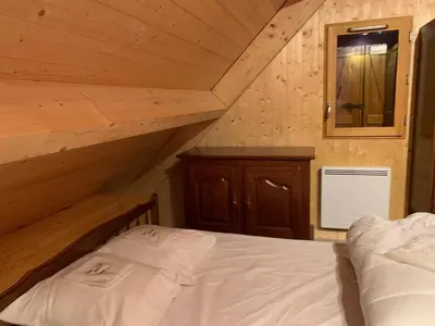 Un ou plusieurs lits dans un hébergement de l'établissement Chalet montagnard Perce Neige avec terrasse plein sud-5 personnes
