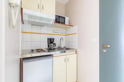 Cuisine ou kitchenette dans l'établissement Appart'City Classic Limoges