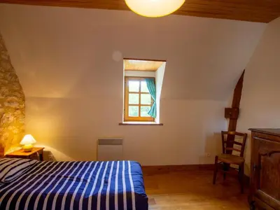 Un ou plusieurs lits dans un hébergement de l'établissement Maison isolée près de Sarlat, idéale pour la détente en famille - FR-1-616-182