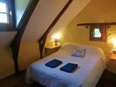 Un ou plusieurs lits dans un hébergement de l'établissement La Petite Maison Pont Blanchard,