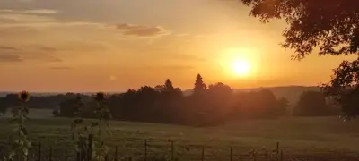 Lever ou coucher de soleil vu de la maison de vacances ou à proximité
