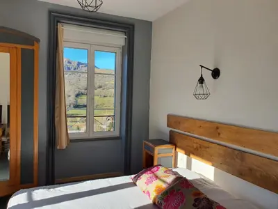 Un ou plusieurs lits dans un hébergement de l'établissement Grand Hotel de la Vallée