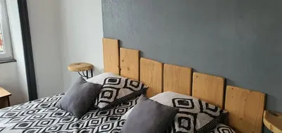 Un ou plusieurs lits dans un hébergement de l'établissement Grand Hotel de la Vallée